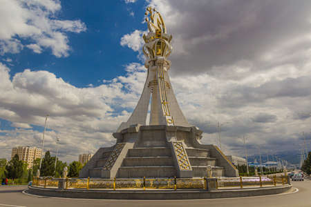 ASHGABAT, TURKMENISTAN - APRIL 18, 2018: Monument on a roundabout in Ashgabat, capital of Turkmenistanのeditorial素材