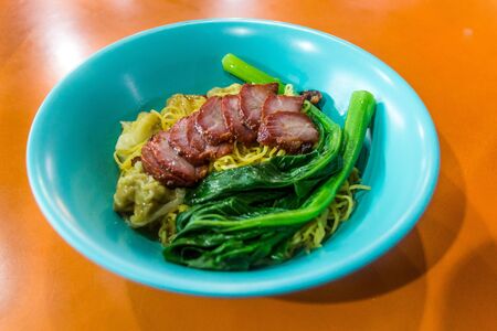 Wanton Mee, meal in the Chinatown hawker center in Singapore.の写真素材