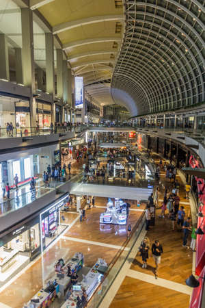 SINGAPORE, SINGAPORE - MARCH 11, 2018: Interior of The Shoppes at Marina Bay Sands shopping mall, Singaporeのeditorial素材