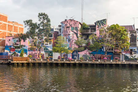 MALACCA, MALAYASIA - MARCH 19, 2018: Street art at the riverside houses next to the Malacca River in Malacca (Melaka), Malaysiaのeditorial素材