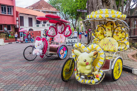 MALACCA, MALAYASIA - MARCH 19, 2018: Colorful rickshaws in the center of Malacca (Melaka).のeditorial素材