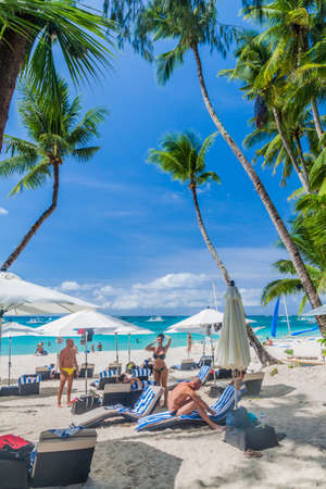 BORACAY, PHILIPPINES - FEBRUARY 1, 2018: Tourists enjoy the White Beach at Boracay island, Philippinesのeditorial素材
