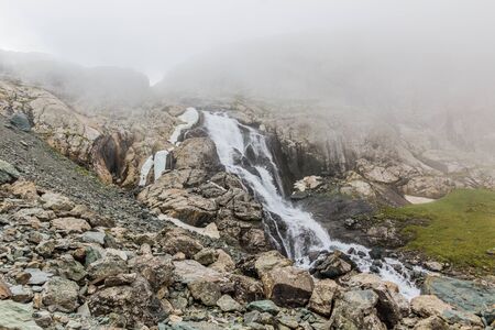 Waterfall near Ala Kul lake in Kyrgyzstan