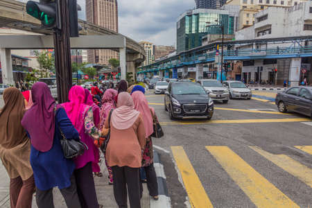 KUALA LUMPUR, MALAYSIA - MARCH 30, 2018: Sultan Ismail street with monorail in Kuala Lumpur, Malaysia.のeditorial素材