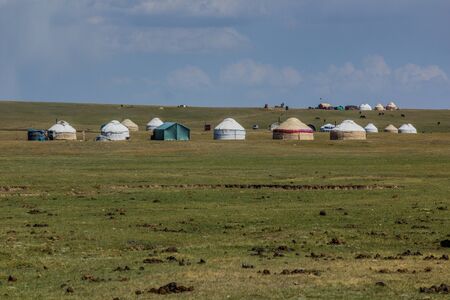 Yurt camp at the shores of Song Kul lake, Kyrgyzstanの写真素材