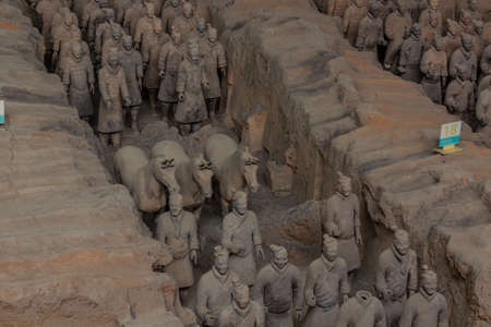 XI'AN, CHINA - AUGUST 6, 2018: Soldiers with horses in the Pit 1 of the Army of Terracotta Warriors...