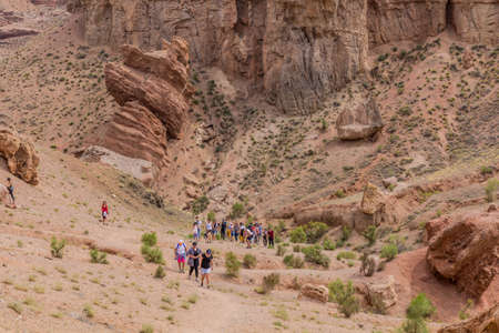SHARYN, KAZAKHSTAN - JULY 28, 2018: Tourists visit Sharyn canyon in Kazakhstan