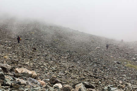 ALA KUL, KYRGYZSTAN - JULY 17, 2018: Hikers near Ala Kul lake in Kyrgyzstanのeditorial素材