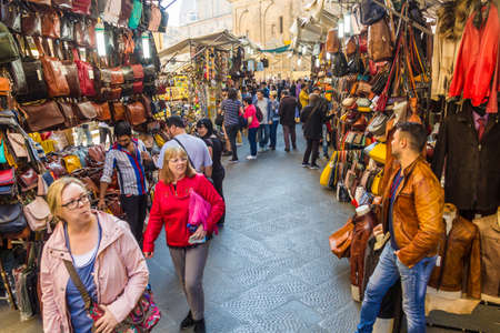 FLORENCE, ITALY - OCTOBER 21, 2018: Leather goods for sale at the San Lorenzo Market in Florence, Italyのeditorial素材