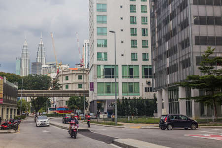 KUALA LUMPUR, MALAYSIA - MARCH 30, 2018: Urban landscape of Kuala Lumpur with monorail and Petronas Towers, Malaysia.のeditorial素材