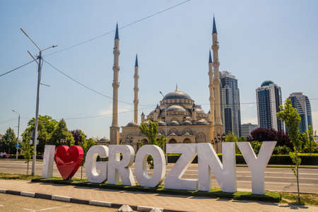 GROZNY, RUSSIA - JUNE 25, 2018: Akhmad Kadyrov Mosque (officially known as The Heart of Chechnya) behind the letters I Love Grozny in Grozny, Russia.のeditorial素材