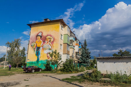 KARAKOL, KYRGYZSTAN - JULY 20, 2018: Street art on a wall in Karakol, Kyrgyzstanのeditorial素材