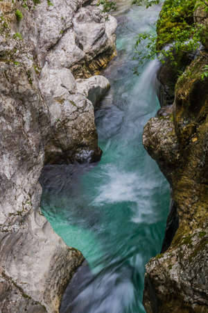 Small waterfall in Soca river gorge near Bovec village, Sloveniaの写真素材