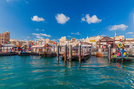 DUBAI, UAE - JANUARY 19, 2018: Abra traditional wooden boat pier at Dubai Creek, UAEのeditorial素材
