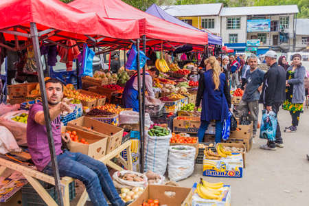 KHOROG, TAJIKISTAN - MAY 25, 2018: Fruit and vegetable stalls at bazaar in Khorog town, Tajikistanのeditorial素材
