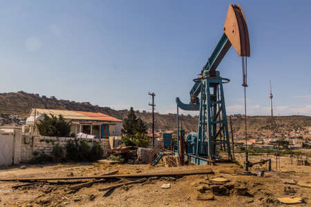 Oil derrick in Baku suburbs, Azerbaijanの写真素材