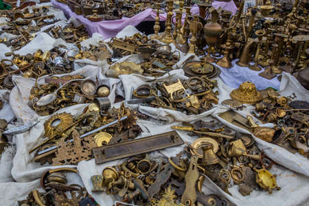 BRUSSELS, BELGIUM - DECEMBER 18, 2018: Antiquities for sale at Marolles Flea Market at the Jeu de Balle square in Brussels, capital of Belgiumのeditorial素材