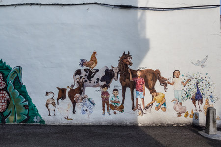 IPOH, MALAYASIA - MARCH 25, 2018: Street art on a wall in Ipoh, Malaysiaのeditorial素材