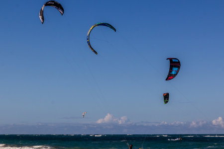 CABARETE, DOMINICAN REPUBLIC - DECEMBER 13, 2018: Kitesurfing at Cabarete beach, Dominican Republicのeditorial素材
