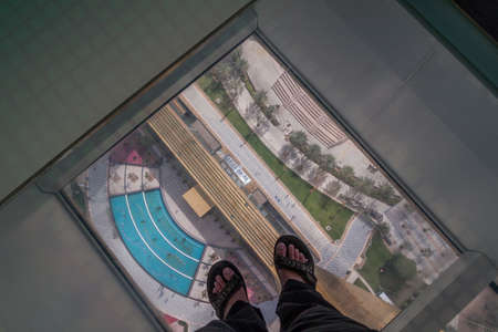 DUBAI, UAE - JANUARY 18, 2018: View through a glass floor of Dubai Frame in Dubai, UAEのeditorial素材