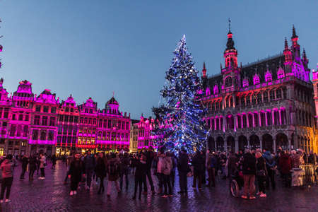 BRUSSELS, BELGIUM - DECEMBER 17, 2018: Evening view of the Grand Place (Grote Markt) with a christmas tree and illuminated buildings in Brussels, capital of Belgiumのeditorial素材