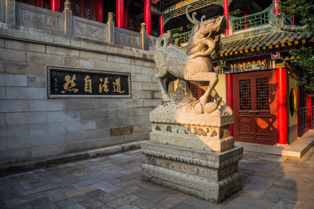 HUA SHAN, CHINA - AUGUST 4, 2018: Scuplture in Jade Spring Temple at the entrance to Hua Shan mountain, Chinaのeditorial素材