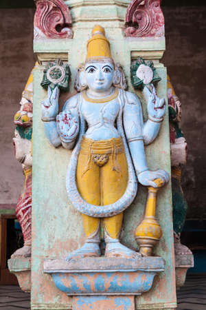 VRINDAVAN, INDIA - FEBRUARY 18, 2017: Colorful carved deity on a temple column in Vrindavan, Uttar Pradesh state, Indiaのeditorial素材
