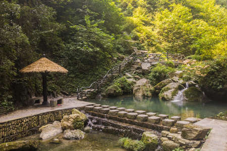Stepping stones crossing near Dehang Miao village, Hunan province, Chinaのeditorial素材
