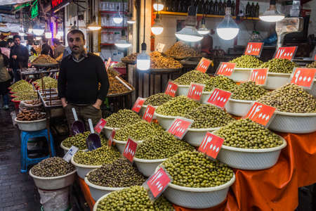 RASHT, IRAN - APRIL 6, 2018: Various types of olives for sale at the bazaar in Rasht, Iranのeditorial素材