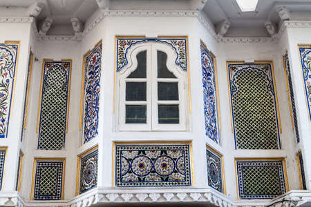 Ornate decorated window of an old house  in Udaipur, Rajasthan state, India