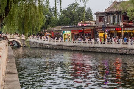 BEIJING, CHINA - AUGUST 26, 2018: Bridge over canal in hutong area of Beijing, Chinaのeditorial素材