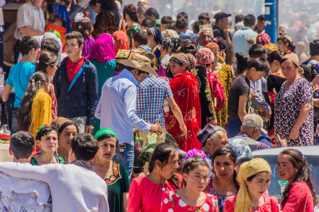 PENJIKENT, TAJIKISTAN - MAY 9, 2018: People on a street in front of bazaar in Penjikent, Tajikistanのeditorial素材