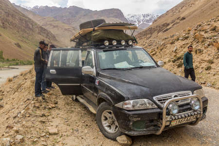 WAKHAN VALLEY, TAJIKISTAN - MAY 22, 2018: Vehicle being repaired in Wakhan valley, Tajikistan.のeditorial素材