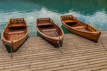 Wooden boats at Bled lake, Sloveniaの写真素材