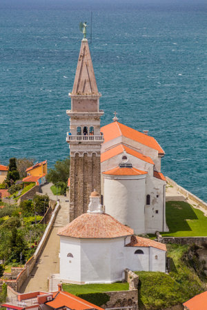Aerial view of St. George's Parish Church in Piran, Sloveniaの写真素材