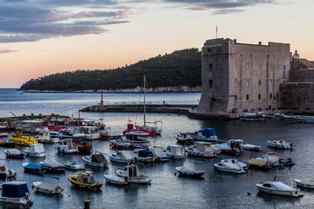 Evening view of the boats in the old town of Dubrovnik, Croatiaのeditorial素材