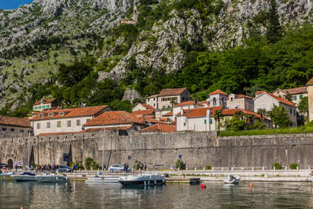 KOTOR, MONTENEGRO - JUNE 1, 2019: Marina and town walls in Kotor, Montenegro.のeditorial素材