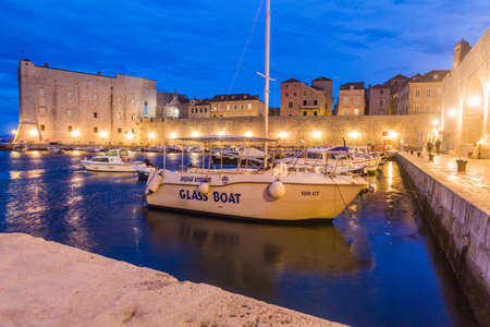 DUBROVNIK, CROATIA - MAY 31, 2019: Evening view of the boats in the old town of Dubrovnik, Croatiaのeditorial素材