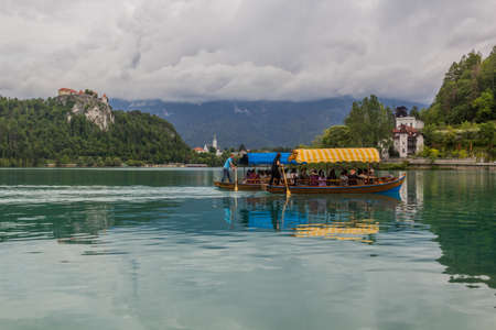 BLED, SLOVENIA - MAY 22, 2019: Boating at Bled lake, Sloveniaのeditorial素材
