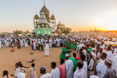 OMDURMAN, SUDAN - MARCH 8, 2019: People observe Sufi Whirling Dervishes during the traditional Friday religious ceremony at Hamed al Nil cemetery in Omdurman, Sudanのeditorial素材
