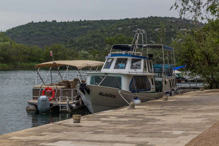 KRKA, CROATIA - MAY 26, 2019: Boat at Visovacko jezero lake in Krka national park, Croatiaのeditorial素材