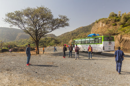 MEKELE, ETHIOPIA - MARCH 28, 2019: Bus on a road near Mekele, Ethiopiaのeditorial素材