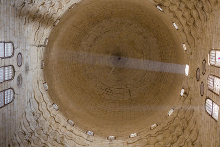CAIRO, EGYPT - JANUARY 29, 2019: Light rays in a dome of Mosque of Sultan al-Muayyad in Cairo, Egypt