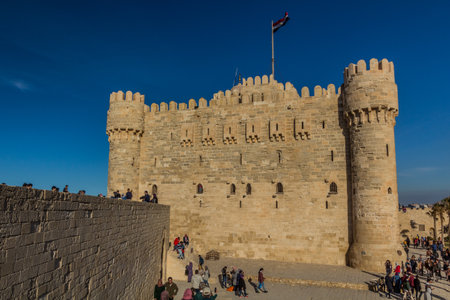 ALEXANDRIA, EGYPT - FEBRUARY 2, 2019: People visit Citadel of Qaitbay (Fort of Qaitbey) in...