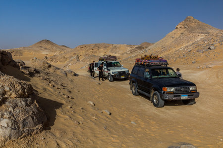 WESTERN DESERT, EGYPT - FEBRUARY 6, 2019: 4WD vehicles at the Crystal Mountain in the Western...