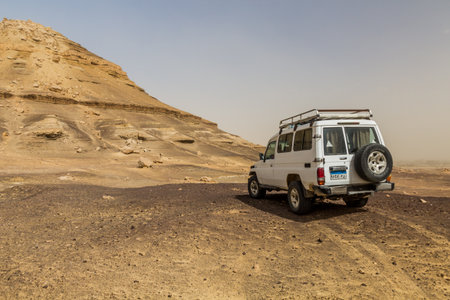 BAWITI, EGYPT - FEBRUARY 5, 2019: 4WD vehicle in a desert near Bahariya oasis, Egyptのeditorial素材