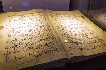 SHIRAZ, IRAN - JULY 8, 2019: Handwritten Quran in the Pars Museum in Shiraz, Iran