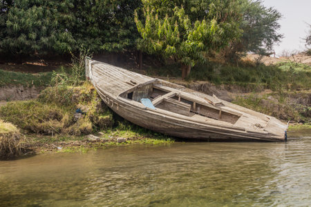 Small wooden boat at the river Nile, Egyptの写真素材