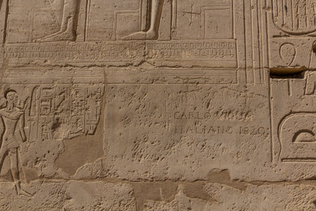 LUXOR, EGYPT - FEB 18, 2019: Wall detail of Ramesseum (Mortuary temple of Ramesses II) at the Theban...