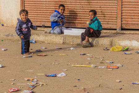 LUXOR, EGYPT - FEB 21, 2019: Children playing on a street in Luxor, Egyptのeditorial素材